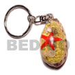 cowrie shells with laminated seashells keychain
