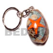 Natural cowrie shells with laminated Keychain Keychain